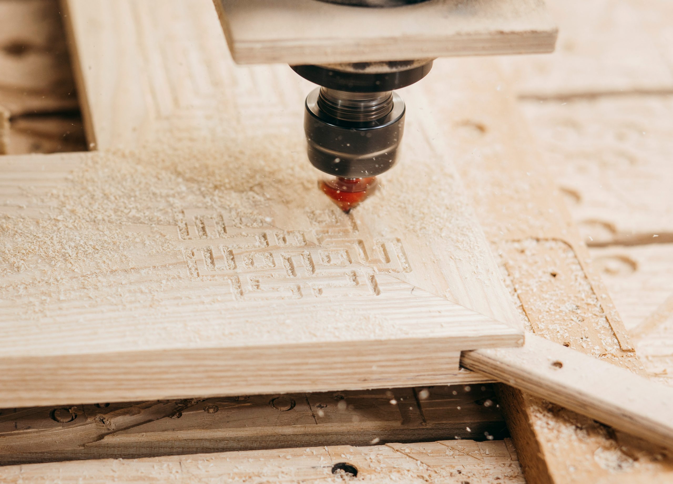close-up-cutting-wood-cnc-milling-machine-garage-2